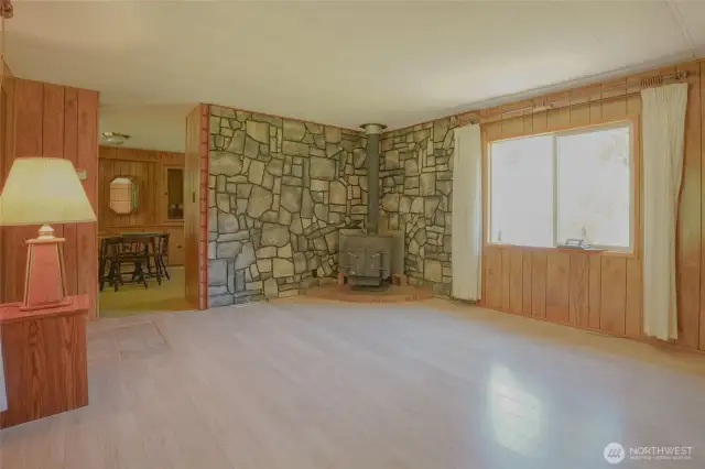 Livingroom with new flooring and double pane windows.