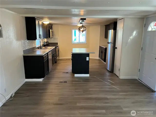 View of kitchen from living area.