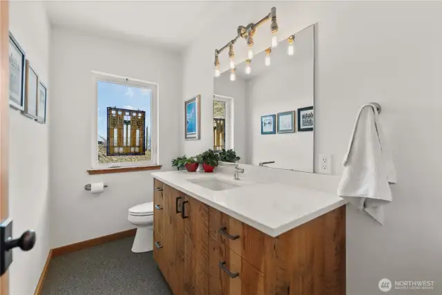 Entry powder room devoted to quality