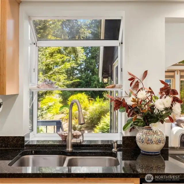 Washing dishes becomes a pleasure with a charming garden view!