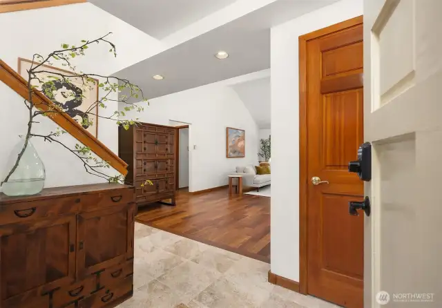 A stylish tiled entryway offers a graceful transition into the main living area. The tile adds visual interest while keeping the space easy to maintain—perfect for Pacific Northwest living.