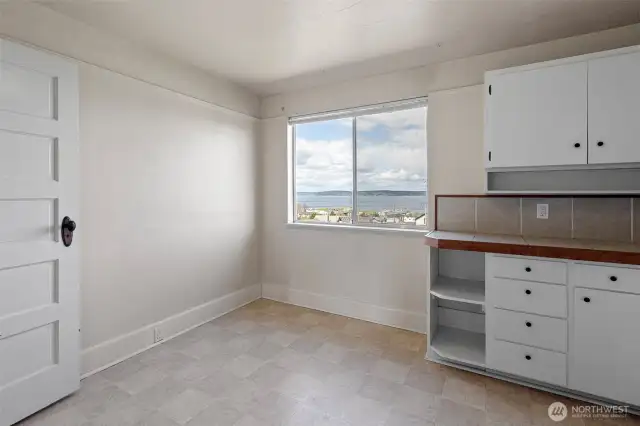 Upper unit kitchen with dining area
