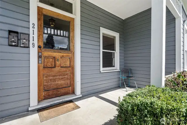 Covered front porch with original front door