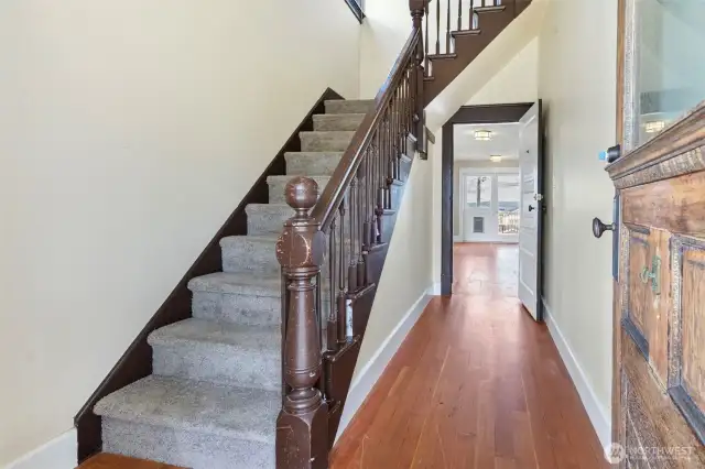 Shared entry hall with original staircase