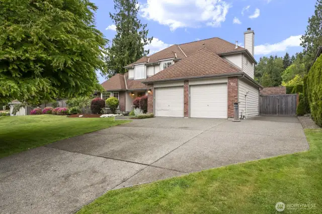 This angle shows the RV parking area next to the house.