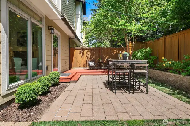 Large outdoor space with deck, turf and gas stub.