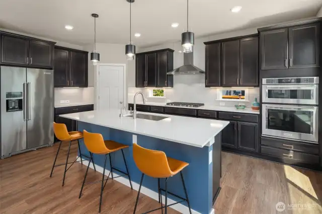 Gorgeous kitchen with an inviting island and an abundance of cabinets.
