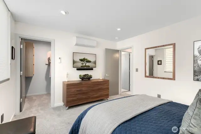 Guest suite with walk-in closet is adjacent to full bath