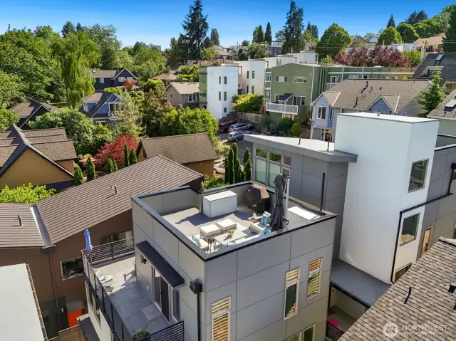Standalone residence is high-impact and low-maintenance with EV-charging parking off alley.  Welcome home!