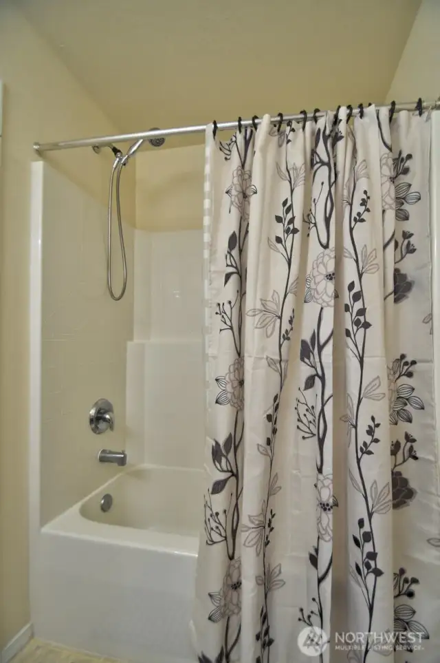 Hall bath with tub and shower