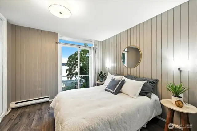 Guest room with deck access to stunning Puget Sound views and fresh sea air.