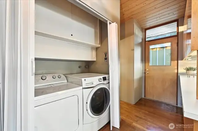 Main floor washer/dryer steps from the kitchen.