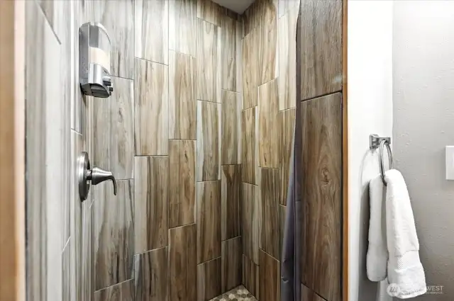 Updated shower surround in the guest shower.