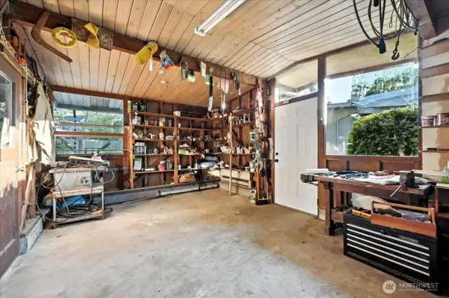 Spacious shop for woodworking, hobbies, and tools.