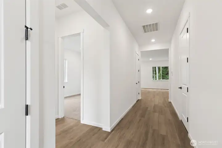 ***Actual Home *** Front entry with 2 bedrooms and bath to the left, garage to the right.