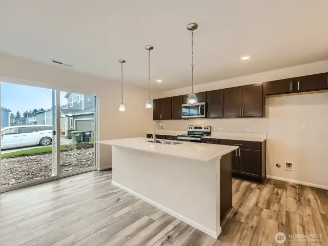 Photo is of the same model home in a different community