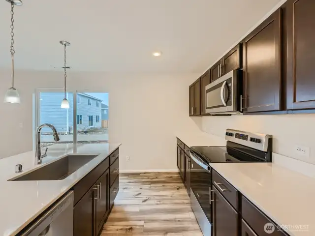 Photo is of the same model home in a different community