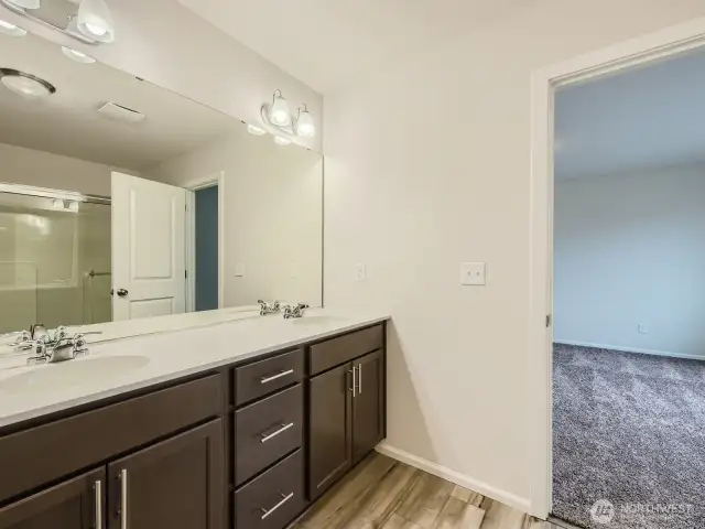 Photo is of the same model home in a different community