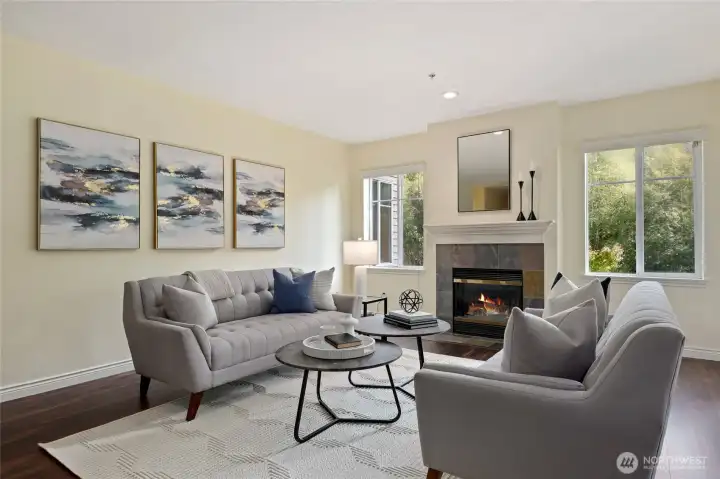 Living room with gas fireplace and views to the river.