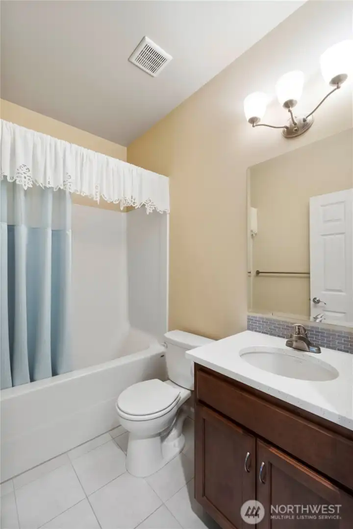 Guest bathroom with quartz counters