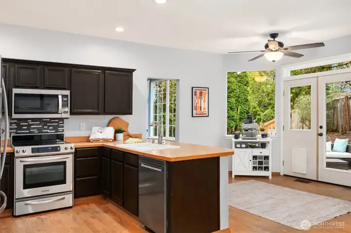 Kitchen to Breakfast Nook to Outdoor Living Spaces