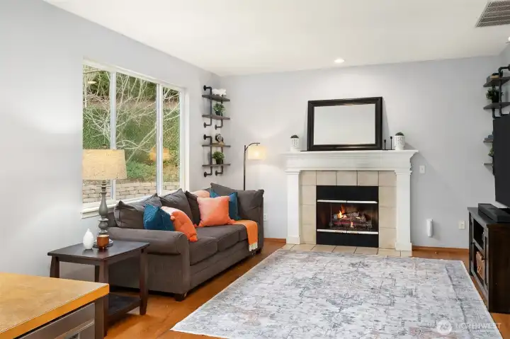 Large Family Room w Gas Fireplace ~ Hardwood Floors Throughout the Main Floor