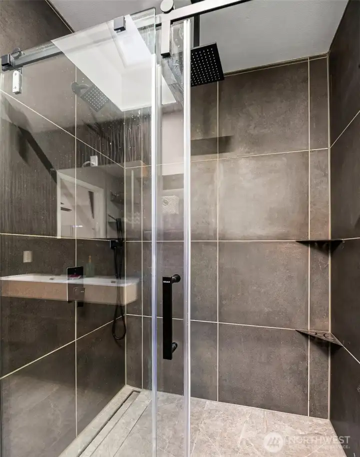 Primary Bathroom w Beautiful Tiled Shower w Glass Sliding Door