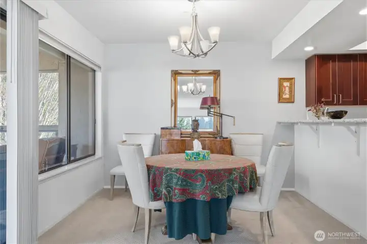 Bright Dining Area Adjacent to Modern Kitchen
