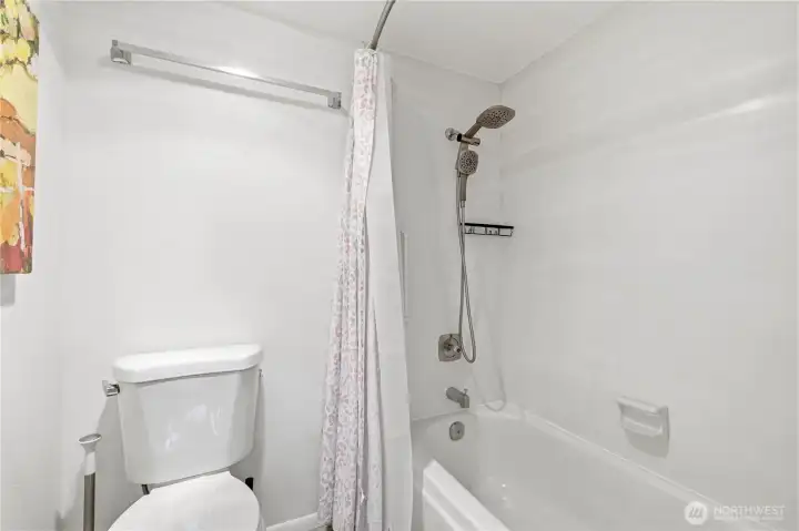 Master Suite Full Bathroom with Elegant Fixtures, Ample Space & Modern Design