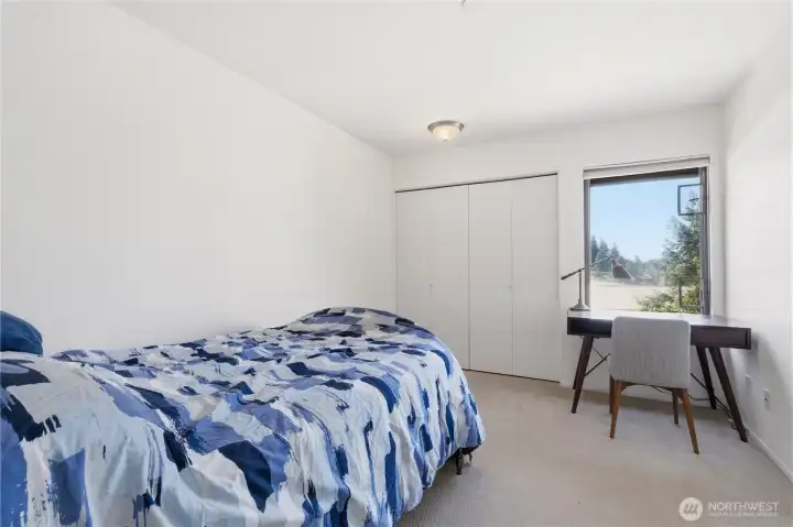 Airy Bedroom with Serene Green Views and Peek of Meydenbauer Bay