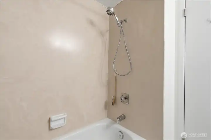 Modern Full Bathroom with Elegant Fixtures and Ample Space