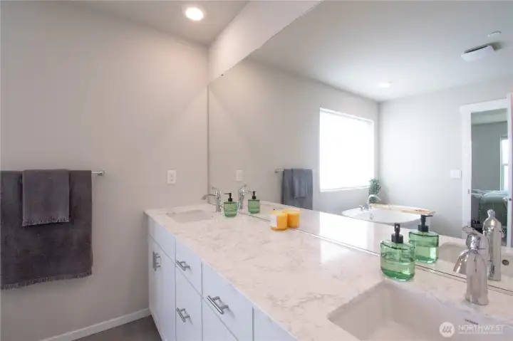 Close up of primary vanity with dual sinks.