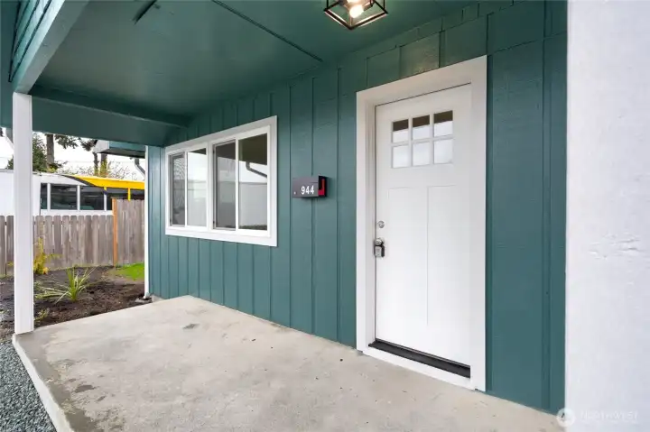 Covered front porch entry.