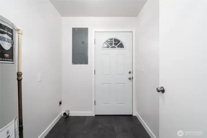 Laundry room with outside access.