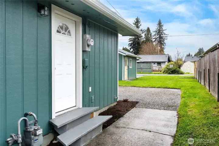 Side door to laundry room.