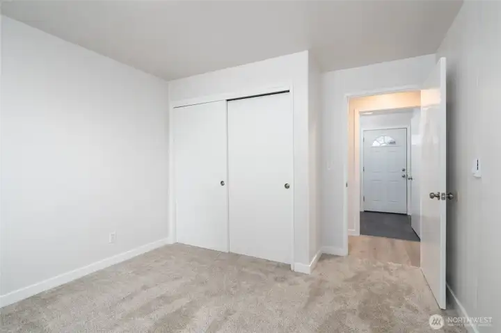 Bedroom 2- Fresh carpet, paint and fixtures.