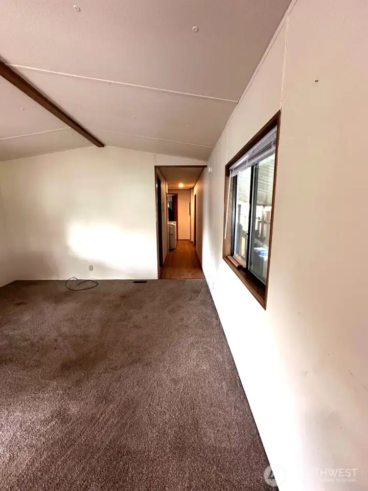 Living area, hallway to bathroom and rooms
