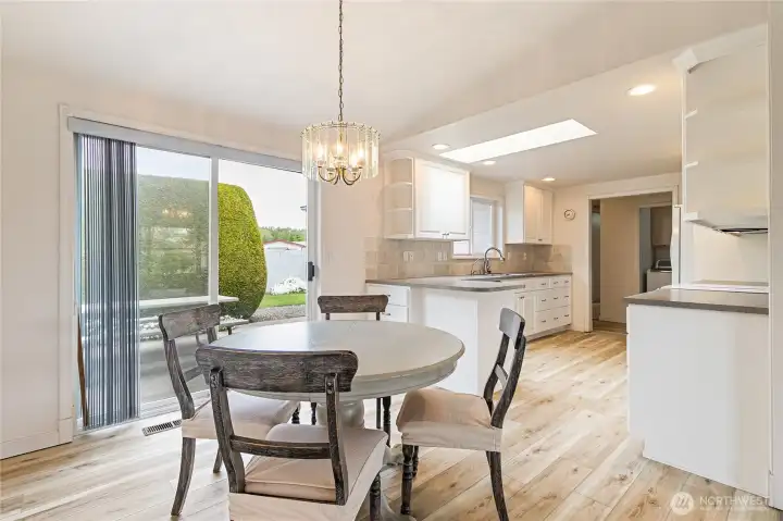 Easy layout to move through the living room, dinning room and kitchen.