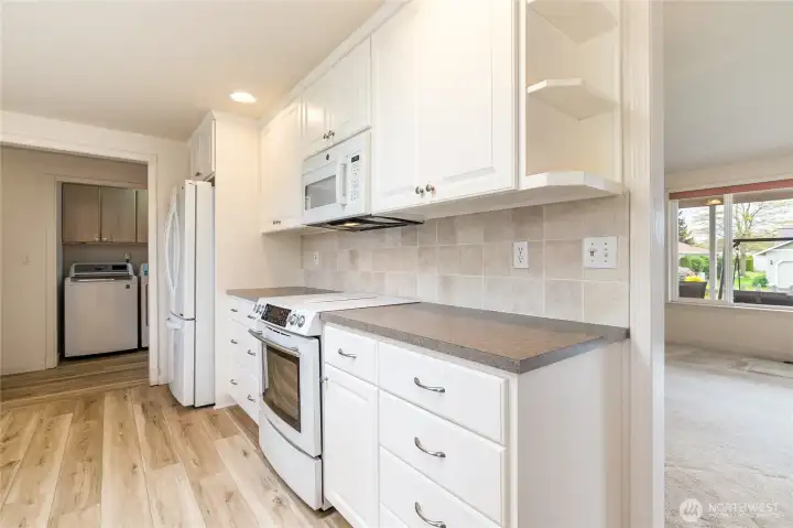 Lots of cabinets and drawers for storage.