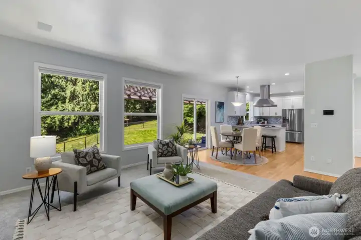 The seamless, open flow between the comfortable family room and the kitchen creates an ideal layout for everyday living and entertaining.