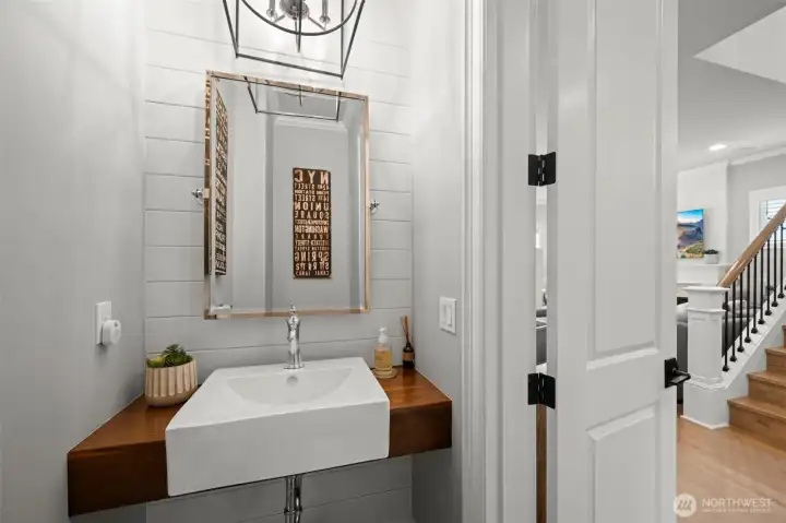 Powder room with custom chandelier