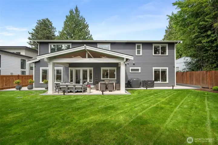 Professionally Landscaped, fully-fenced flat backyard