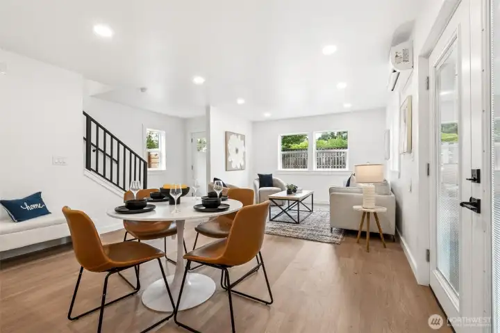French doors on the right lead to the side yard.