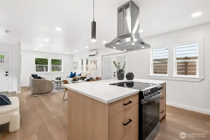 Kitchen island with stunning quartz countertop.