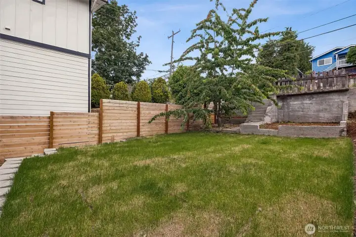 Large and fully fenced yard.