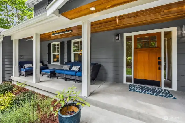 Who doesn't LOVE a country-style covered front porch?! -- With the added luxury of infrared heaters for year-round enjoyment!