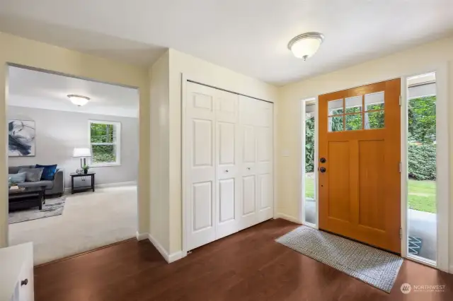 Beautiful new wood front door welcomes you as you step into the expansive foyer.