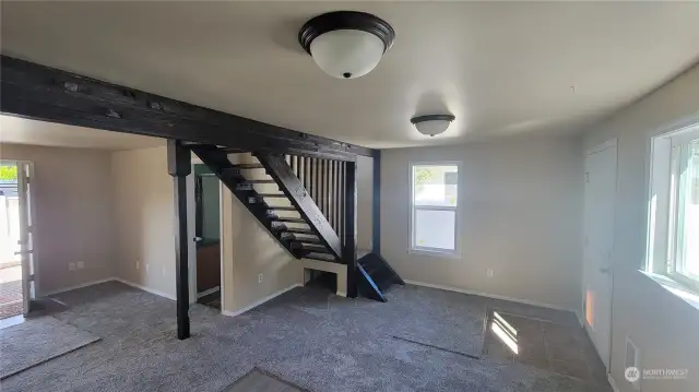 Dining room and stairway to upper bonus room