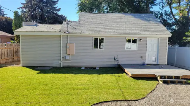 New sod and deck area in rear yard