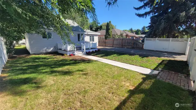 Large front yard with nice trees for shade